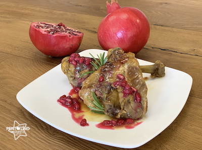 Pollo con salsa al melograno